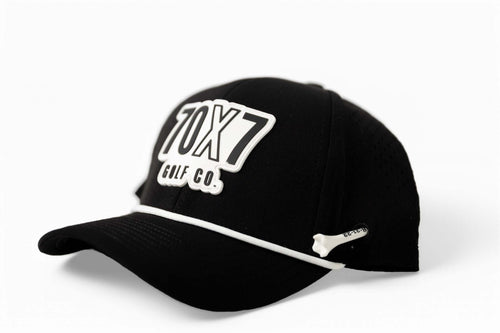 left side Black 70x7 Golf Co. snapback hat with bold white embroidered logo and mesh back – The Comeback Lid by 70x7 Golf Co.