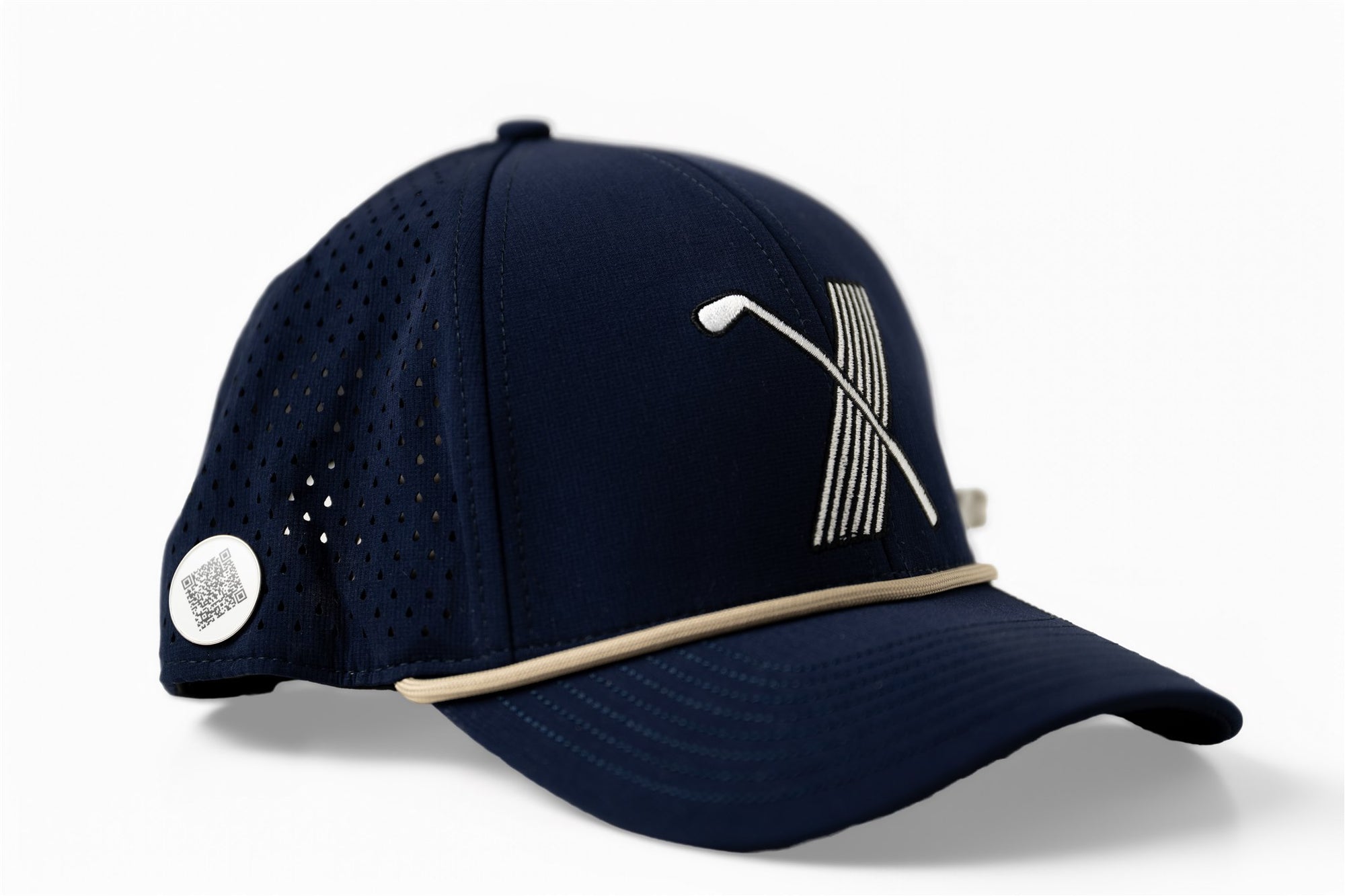 right side Navy blue golf hat with white embroidered X logo made of golf club and stripes, side view with contrast beige piping and perforated mesh back – The Quiet Lead Lid by 70x7 Golf Co.