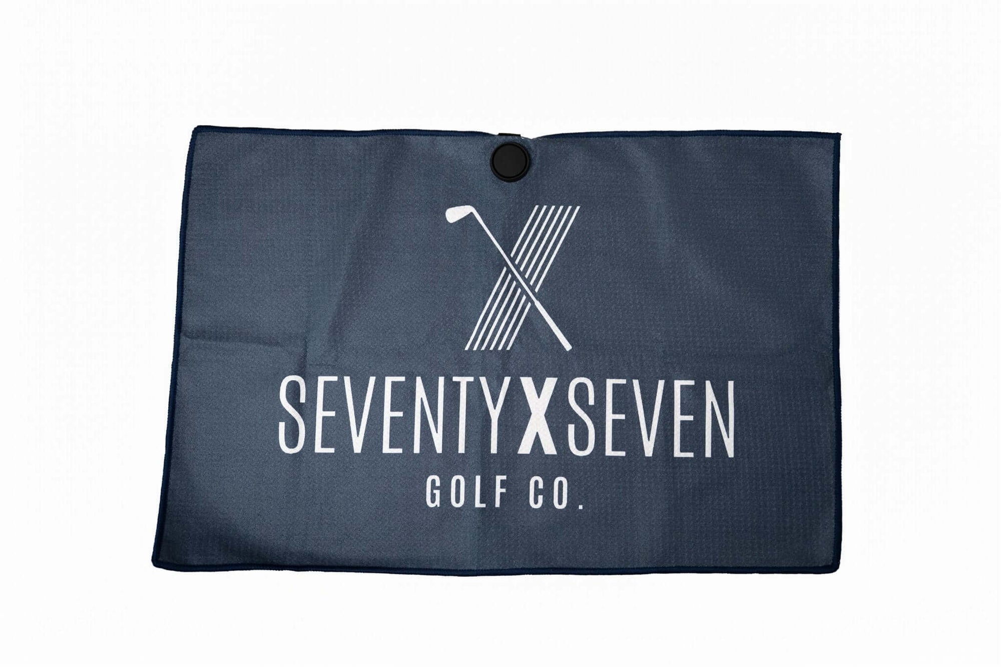 Dark blue golf towel with SEVENTY X SEVEN Golf Co. logo and golf club X graphic, featuring magnetic mount – The Mullie Magnet by 70x7 Golf Co.