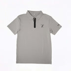 Gray Forgiveness golf polo shirt with classic collar, zippered placket, 70x7 Golf Co. logo on chest, and SEVENTYXSEVEN text on sleeve